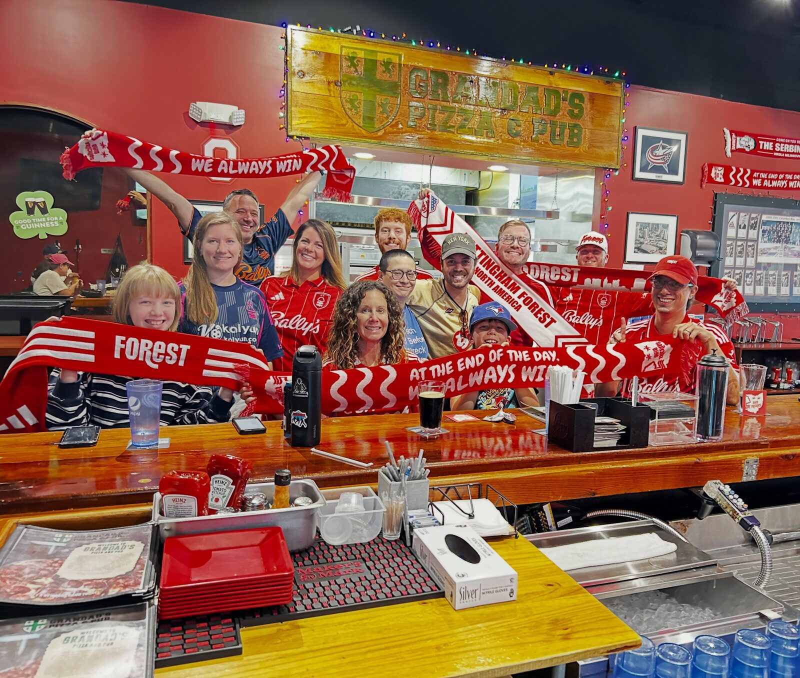 The Ohio Trickies gathered at Grandad's Pizza & Pub with Nottingham Forest scarves held up